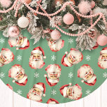 Green Vintage Santa Claus Face Watercolor<br><div class="desc">Add a touch of nostalgic charm to your holiday decor with our Green Vintage Santa Claus Face Watercolor Tree Skirt! This festive tree skirt features a delightful watercolor pattern of classic Santa Claus faces set against a vibrant background, adorned with delicate snowflakes. Perfect for bringing a warm and joyful atmosphere...</div>