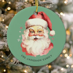 Green Vintage Watercolor Santa Claus Christmas Ceramic Tree Decoration<br><div class="desc">Celebrate the festive season with our Green Vintage Watercolor Santa Claus Christmas Ceramic Ornament! This charming ornament features a nostalgic Santa Claus design set against a stylish solid background, combining vintage charm with modern flair. Perfect for adding a festive touch to your Christmas Tree. Personalise this custom design with your...</div>