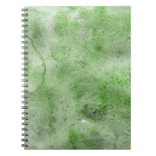 Green watercolor and ink paper textures on white b notebook