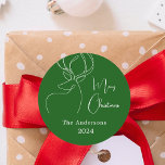 Green white abstract reindeer modern Christmas Classic Round Sticker<br><div class="desc">A green background,  and a white abstract one line reindeer.  Personalise and add a name and year. Text: Merry Christmas</div>