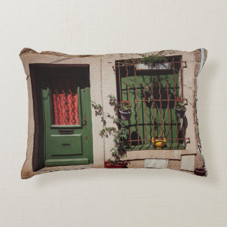 GREEN WOODEN DOOR WITH GREEN PLANT DECORATIVE CUSHION