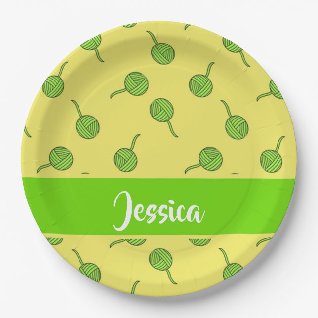 Green wool rolls on yellow paper plate (Front)