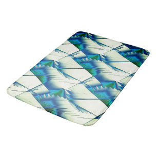 Green zigzag or saws on intense cyan to royal blue bath mat