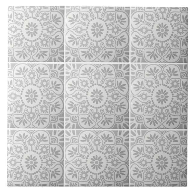Grey and white geometric  ceramic tile (Nine gray and white geometric tiles shown together.)