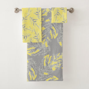 Grey and yellow leaves on a striped background. bath towel set