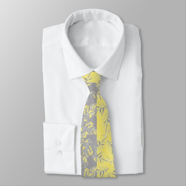 Grey and yellow leaves on a striped background.  tie (Tied)