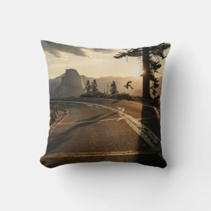 Grey asphalt road near mountain in the morning cushion