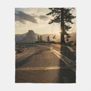 Grey asphalt road near mountain in the morning fleece blanket