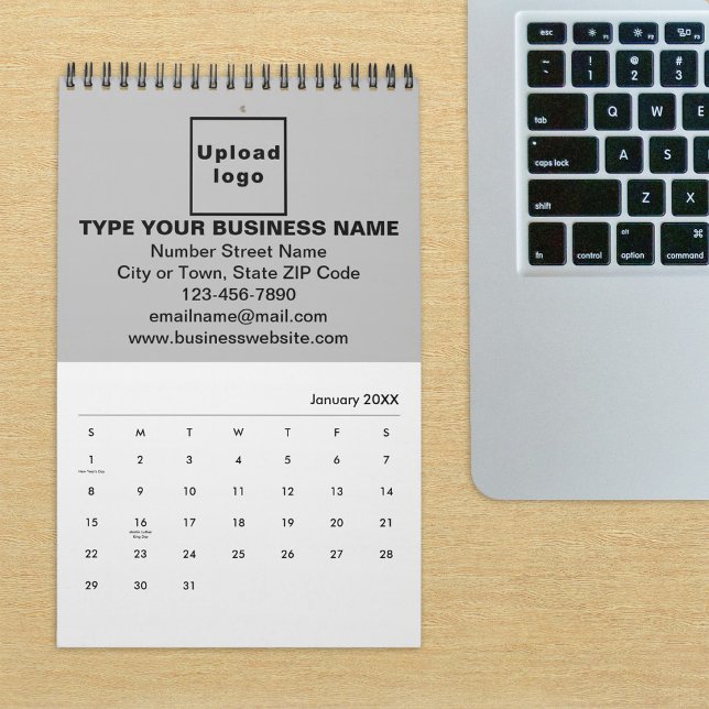 Grey Business Brand on Calendar (Build brand name awareness. Gray business branding on calendar displayed on office desk.)