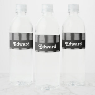 Grey camera film on black water bottle label