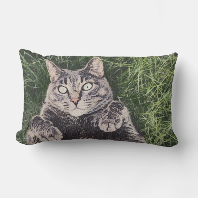 grey cat lying in the grass Throw Pillow (Front)