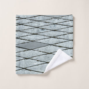 Grey concrete pavement wash cloth