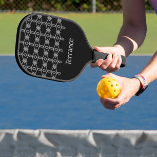 Grey decorative rope fencing black pickleball paddle