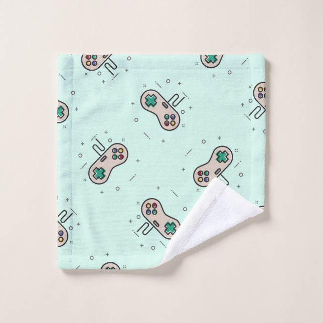 Grey game joystick on blue wash cloth (Wash Cloth)
