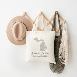 Grey Michigan Wedding Welcome Tote Bag<br><div class="desc">Welcome out of town wedding guests with a bag full of snacks and treats personalised with the state where you're getting married and the bride and groom's names and wedding date. Click Customise It to move the heart to show any city or location on the state map. Use the design...</div>