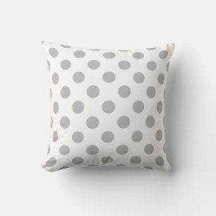 Grey polka dots on white cushion