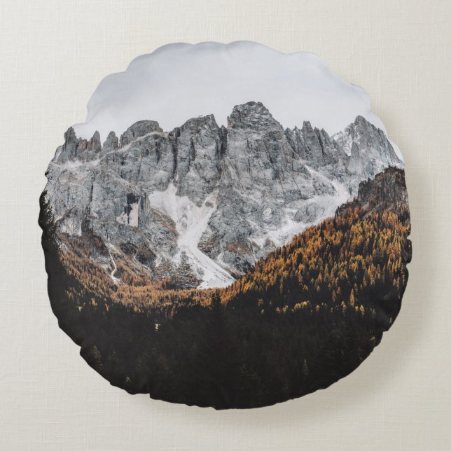 GREY ROCKY MOUNTAIN WITH TREES BELOW DAYTIME ROUND CUSHION (Front)