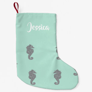 Grey seahorses on blue small christmas stocking