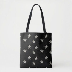 Grey stars pattern on black tote bag