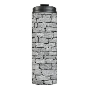 Grey stone wall as an abstract background. thermal tumbler