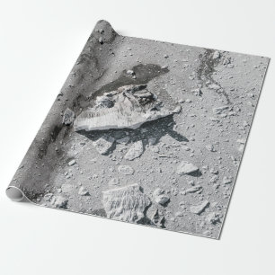 Grey stones on grey dirt wrapping paper