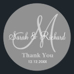 Grey Thank You Wedding Monogram Sticker<br><div class="desc">Initial Stickers with bride and groom name, date of wedding and a thank you message to express your gratitude on your wedding day or any special occasion. .This monogram wedding sticker is in grey colour .More colours are available for your choice . You can also customise the colour and font...</div>