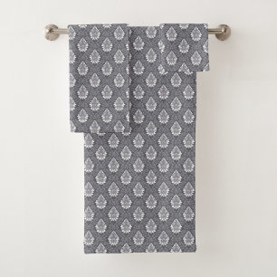 Grey towels with ornate, white paisley patterns