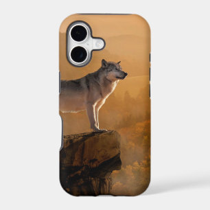 Grey wolf standing on a rock in the forest