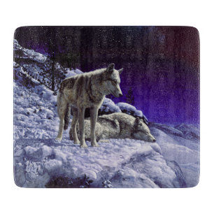 Grey Wolves in Winter Snow at Night Cutting Board