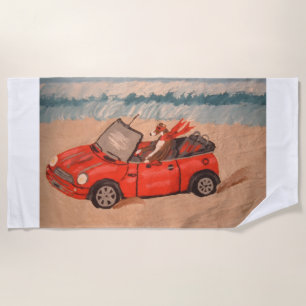 Greyhound in red car at the Beach Towel