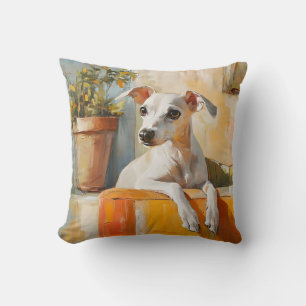 Greyhound on a sofa cushion