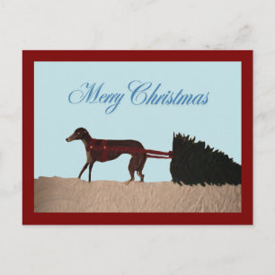 Greyhound pulling a Christmas Tree through Snow Postcard