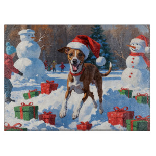 Greyhound Running in Snow with Christmas Hat Cutting Board