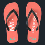 Groom Mr. Coral Jandals<br><div class="desc">Bright coral with Mr. and Last Name written in white text and date of wedding in turquoise blue to personalise with black accents.  Beach destination or honeymoon flip flops for the new groom.  Original designs by TamiraZDesigns.</div>