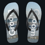 Groom Ocean Waves Beach Sand Jandals<br><div class="desc">Pretty Blue Sky with Light Fluffy White Clouds, Blue Sea, Crashing Ocean Waves and Beach Sand. Unisex Flip Flops with Groom and Date of Marriage written in a white colour text. PERSONALIZE with your Wedding DATE (or delete text). The wedding date is written in the sand. Shown with Wide Black...</div>