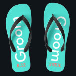 Groom Turquoise Jandals<br><div class="desc">Groom is written in white text against bright turquoise blue with black accents.  Personalise with date of wedding in coral. Cool beach destination or honeymoon flip flops. Original designs by TamiraZDesigns.</div>