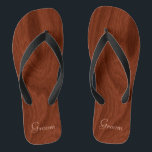 Groom Wedding Day Rustic Wood Look Beach Honeymoon Jandals<br><div class="desc">Rustic wood look groom thong sandals flip flops perfect for beach weddings- Reads Groom in elegant, pastel lettering at the bottom. Elegant, rich mahogany woodgrain pattern look background. Note: Wood is printed image. Rustic wedding favours for bridal party members. Just change text templates to create your own personalised wedding party...</div>