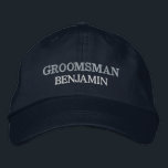 Groomsman Bachelor Party Wedding Role Custom Embroidered Hat<br><div class="desc">Add a name and the role to play at the wedding by clicking the "Personalised" button. This chic and stylish cap serves as the perfect memento of a memorable getaway with your favourite buddies. The front of the cap showcases a captivating sports-inspired "Groom" typography that perfectly captures the fun and...</div>