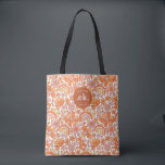 Groovy Retro Orange Florals Monogram Tote Bag<br><div class="desc">The Groovy Retro Orange Florals Monogram Tote Bag is a stylish and functional accessory perfect for any occasion. With its bold orange floral pattern and personalised monogram, this tote adds a vibrant pop of colour to your wardrobe. Spacious enough to carry all your essentials, whether you're heading to the beach,...</div>