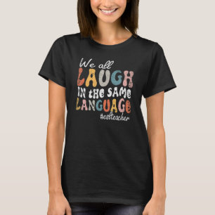 Groovy We All Laugh In The Same Language ESL Teach T-Shirt