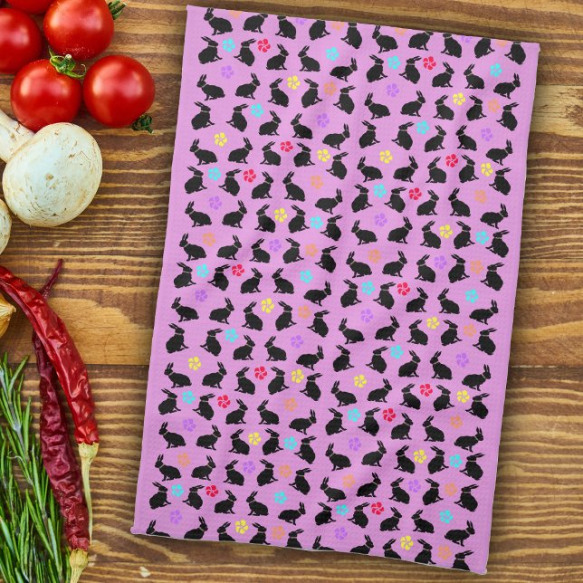 Group Spring Black Sitting Rabbits Flowers Pink Tea Towel (black silhouette rabbits colourful flowers on pink kitchen towel for spring or Easter.)