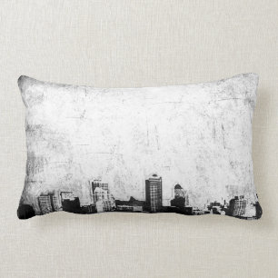 Grungy city background in black and white lumbar cushion