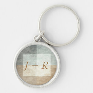 grungy watercolor-like graphic abstract key ring