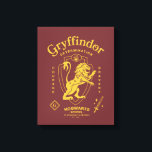 GRYFFINDOR™ Determination Courage Bravery Crest Canvas Print<br><div class="desc">Show your house pride with this bold Gryffindor™ crest design, celebrating the values that define the bravest of witches and wizards. Featuring the iconic lion standing proudly before a shield, this striking artwork highlights Gryffindor’s core traits — Courage, Determination, and Bravery — in a powerful, vintage-inspired layout. The rich house...</div>