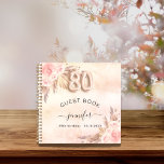 Guest book 80th birthday pampas grass rose gold<br><div class="desc">For an elegant 80th birthday party. A rose gold,  blush pink rustic faux metallic looking background. Decorated with rose gold,  pink florals,  pampas grass. Personalise and add a name and date.</div>