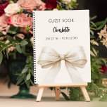 Guest book beige cream bow SWEET 16<br><div class="desc">A beige,  cream background colour. Decorated with a large bow.  Personalise and add your name,  text.</div>