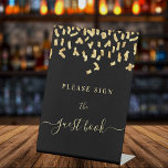 Guest book sign black gold confetti<br><div class="desc">A black background decorated with faux gold confetti. Text: Please sign the guest book.</div>