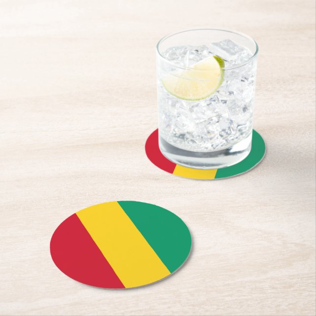 Guinea flag round paper coaster (Insitu)