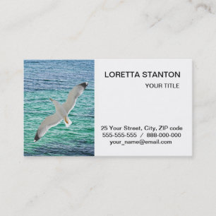 Gull flying above a sea business card
