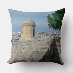 Gun turret on old city walls in Valletta, Malta Cushion